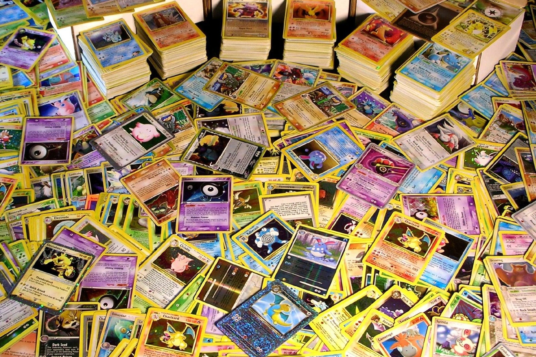 A spread of vintage Pokémon trading cards